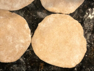 Rolled dough pita pockets six inches in size