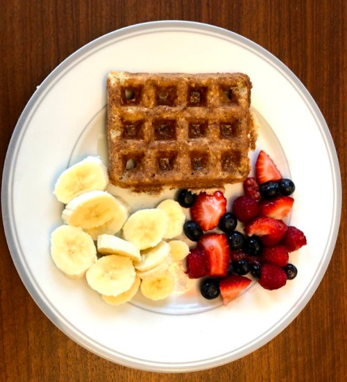 Waffles with bananas and berries