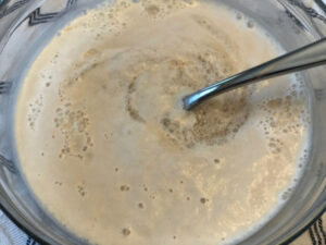 Water, sugar and yeast mix.