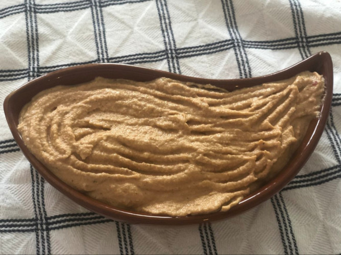 Plant based queso rojo in a bowl