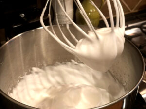 Whipped aquafaba in stand-mixer bowl