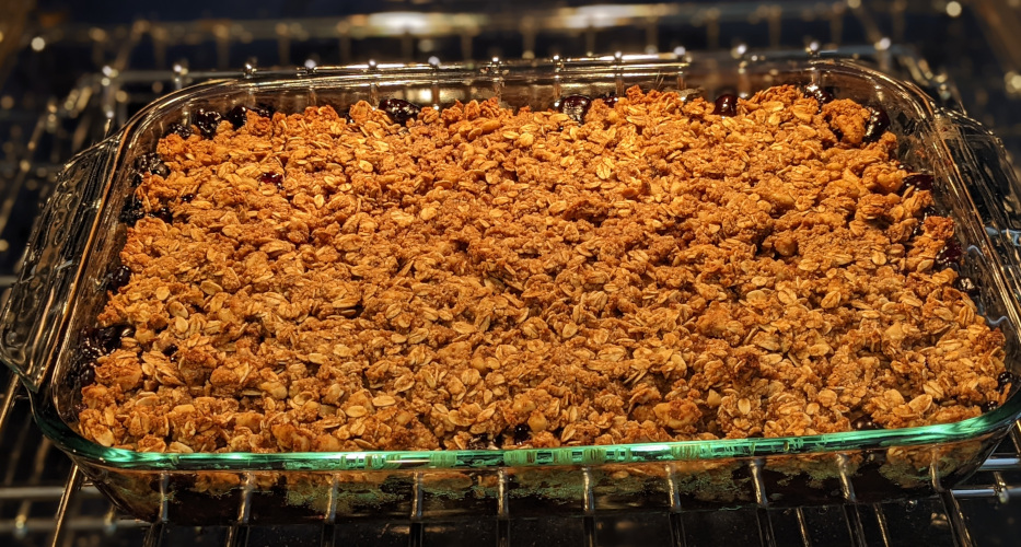 blueberry crisp dish in oven
