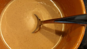 Peanut butter sauce in a container