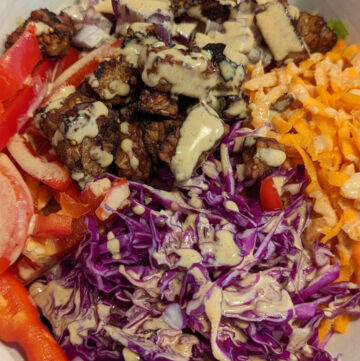 rainbow bowl with lime peanut butter sauce