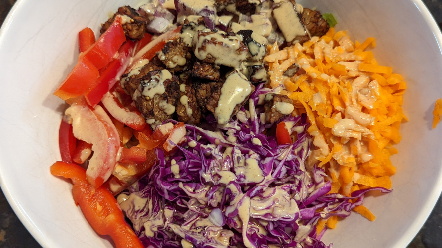 rainbow bowl with lime peanut butter sauce