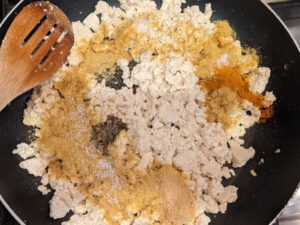 tofu with spices in a pan